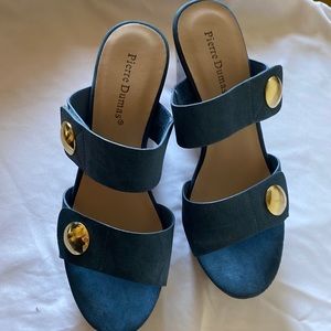 Woman’s Pierre Dumas sandals.